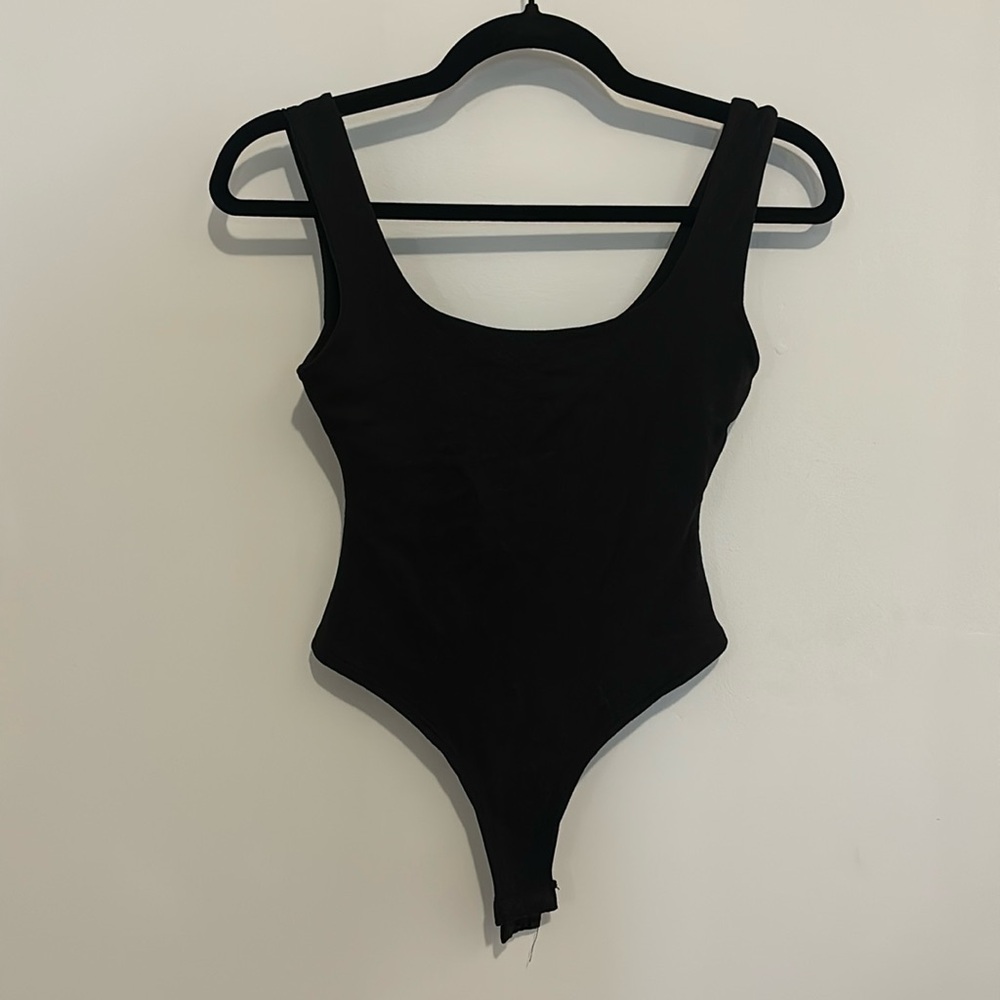 Black thing body suit
